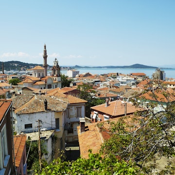 Terracotta rooftops of houses on Agean coast seen from Taksiyarhis Pension.