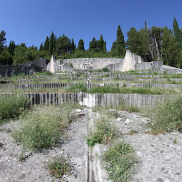 The Partisan Memorial Cemetery in Mostar is located in Mostar, Bosnia and Herzegovina. It was built in 1965 in honor of the Yugoslav Partisans of Mostar who were killed during World War II in Yugoslavia.