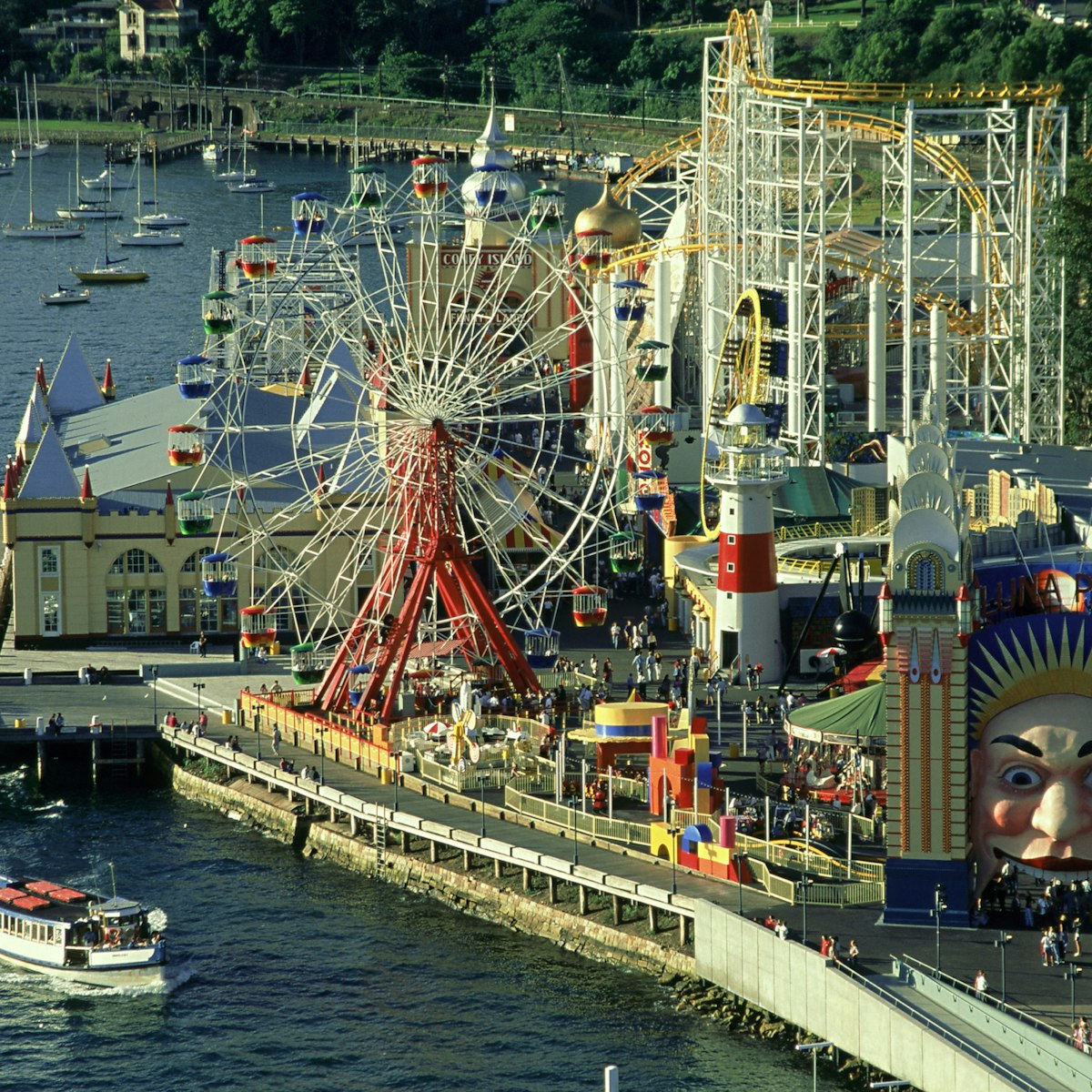 overview of luna park, ferry in foreground, milsons point, nsw