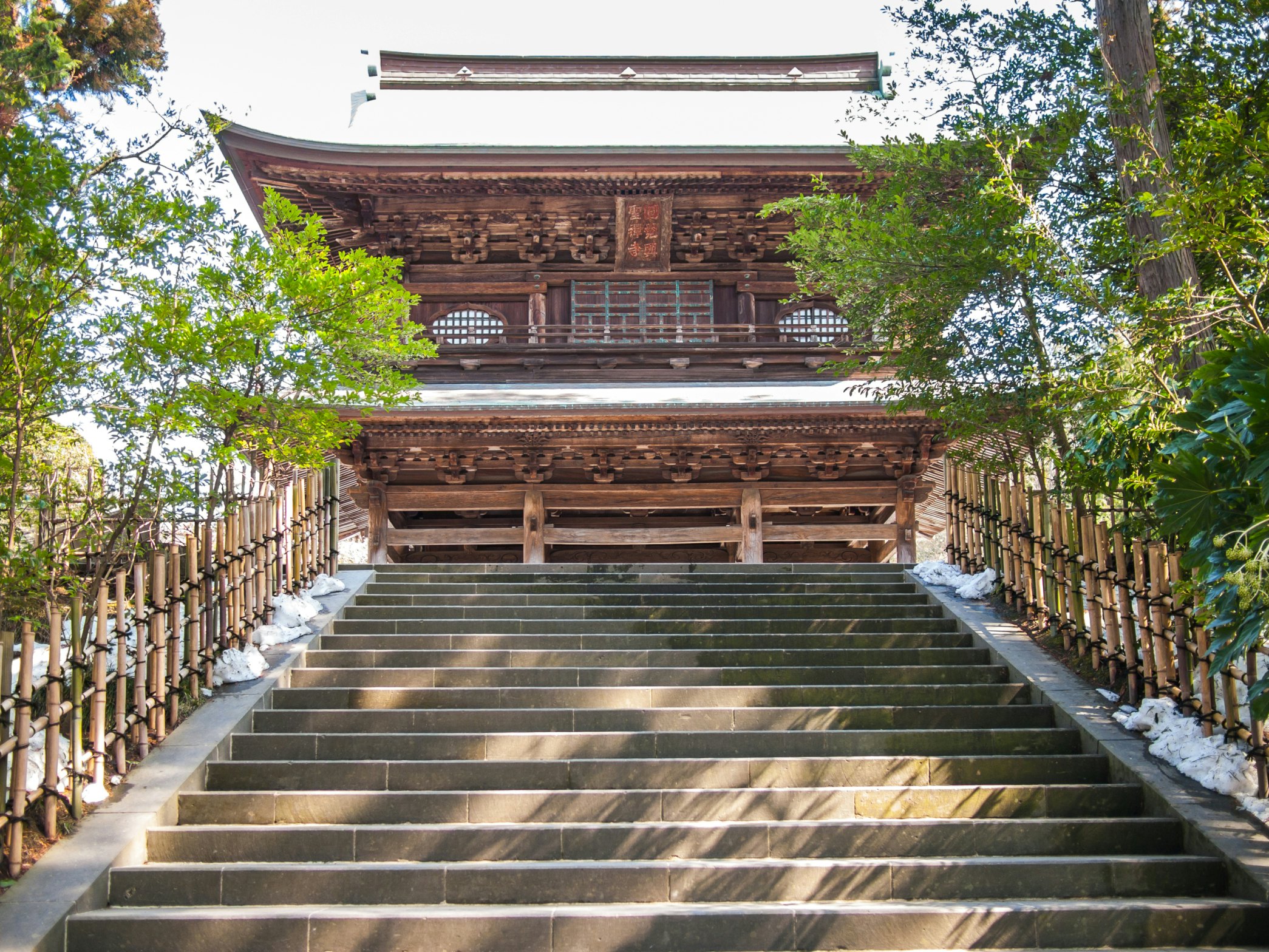 The incredible Engaku Ji entrance building build in wood in the city of Kamakura; Shutterstock ID 450122116; Your name (First / Last): Laura Crawford; GL account no.: 65050; Netsuite department name: Online Editorial; Full Product or Project name including edition: BiA: Takayama, south of Tokyo POI images for online