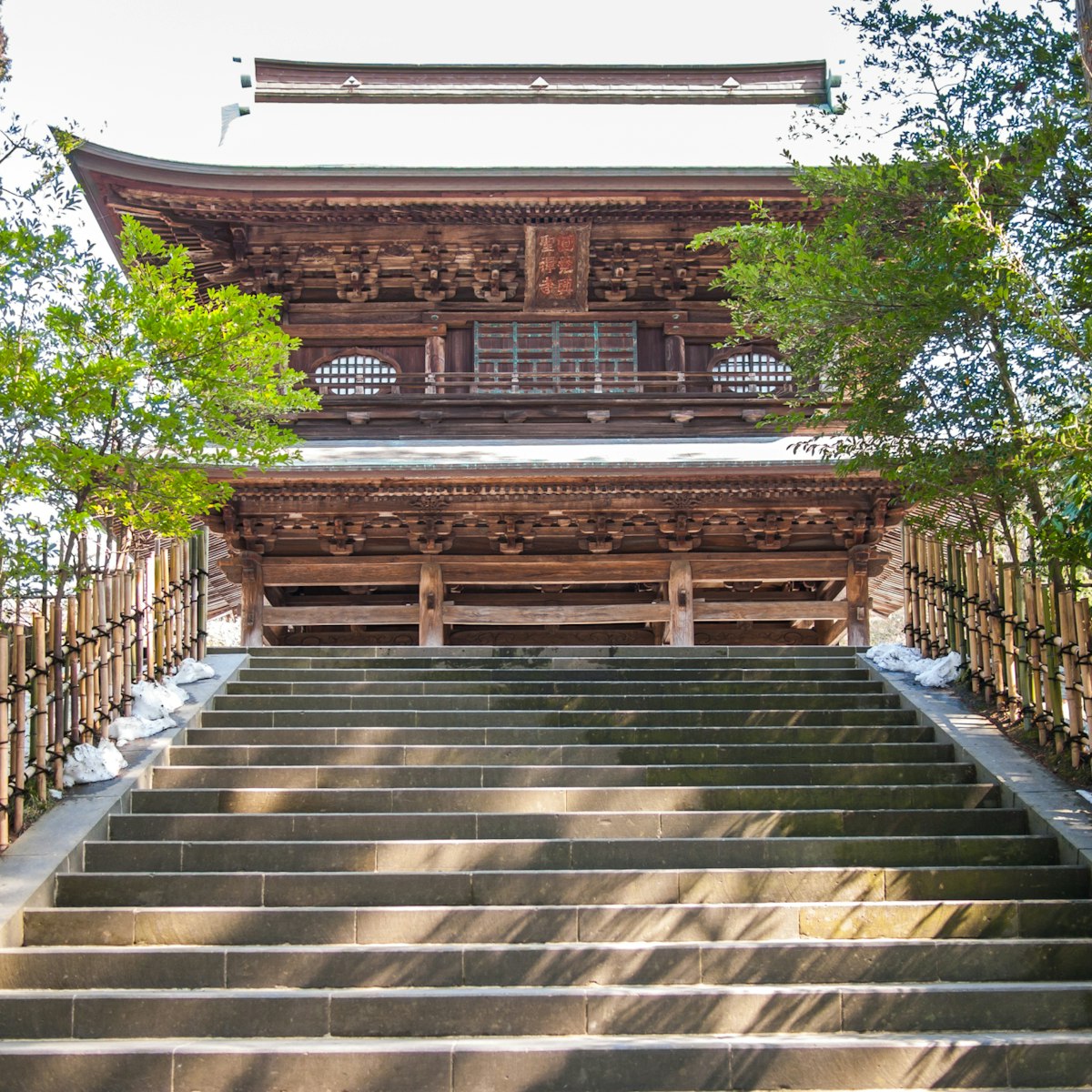 The incredible Engaku Ji entrance building build in wood in the city of Kamakura; Shutterstock ID 450122116; Your name (First / Last): Laura Crawford; GL account no.: 65050; Netsuite department name: Online Editorial; Full Product or Project name including edition: BiA: Takayama, south of Tokyo POI images for online