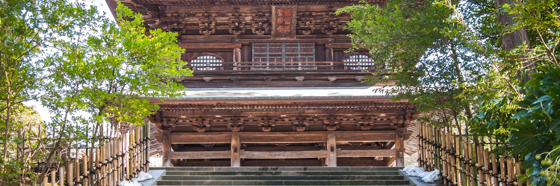 The incredible Engaku Ji entrance building build in wood in the city of Kamakura; Shutterstock ID 450122116; Your name (First / Last): Laura Crawford; GL account no.: 65050; Netsuite department name: Online Editorial; Full Product or Project name including edition: BiA: Takayama, south of Tokyo POI images for online