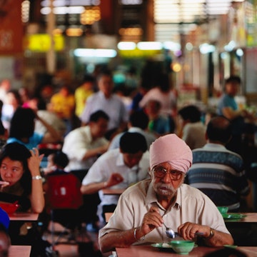 People eating at Tekka Centre Market, Little India.