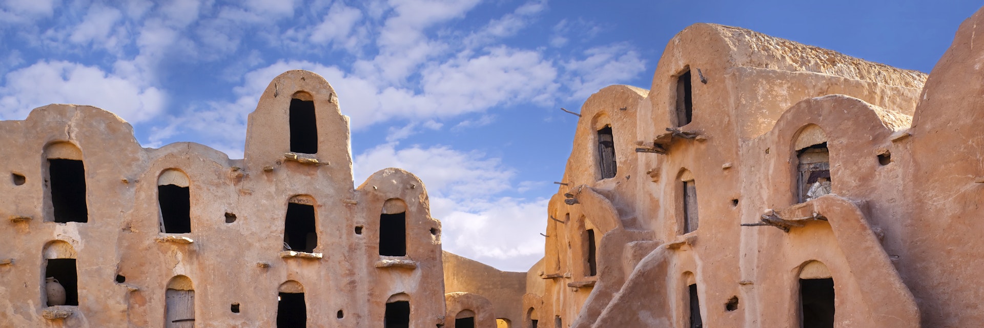 Ksar Ouled Soltane is a fortified granary, or ksar, located in the Tataouine district in southern Tunisia. The ksar is spread out over two courtyards, each of which has a perimeter of multi-story vaulted granary cellars, or ghorfas. Like other ksour (plural of ksar) created by North African Berber communities, Ksar Ouled Soltane is located on a hilltop, to help protect it from raiding parties in previous centuries.