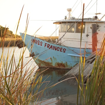 Shrimp boat in a waterway near Apalachicola marina.