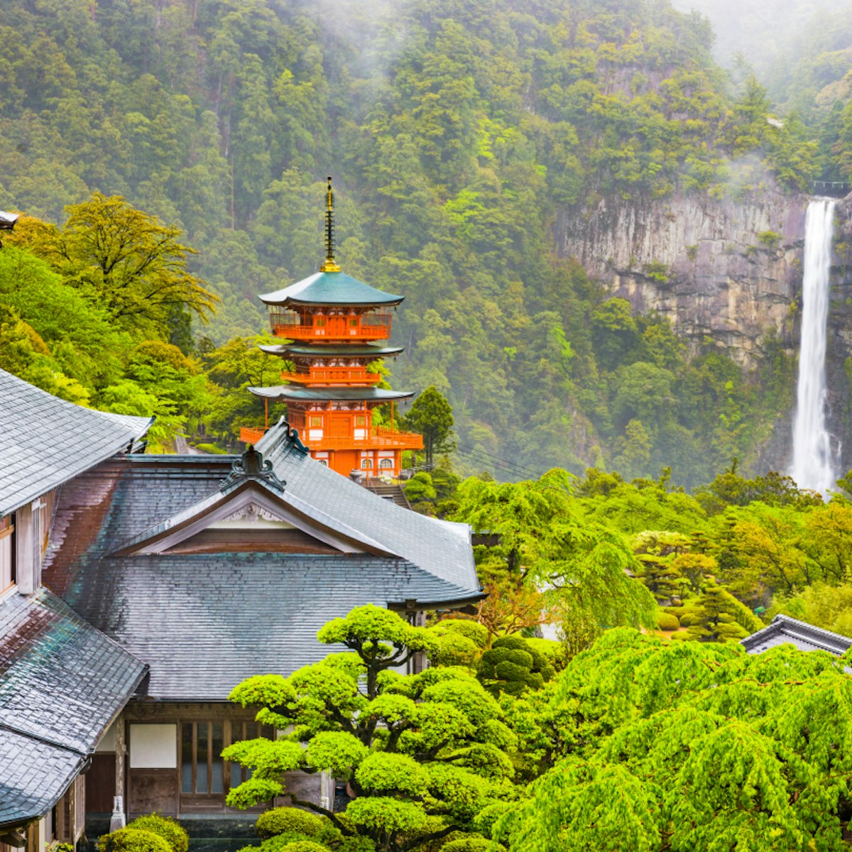 Nachi, Japan at the pagoda of Seigantoji and Nachi no Taki waterfall.; Shutterstock ID 693876538; Your name (First / Last): Laura Crawford; GL account no.: 65050; Netsuite department name: Online Editorial; Full Product or Project name including edition: Kii Peninsula page online images for BiT