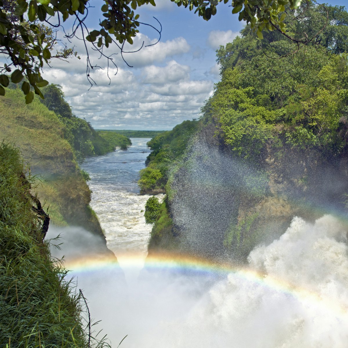 A rainbow arches over the spectacular Murchison Falls, Uganda, Africa
