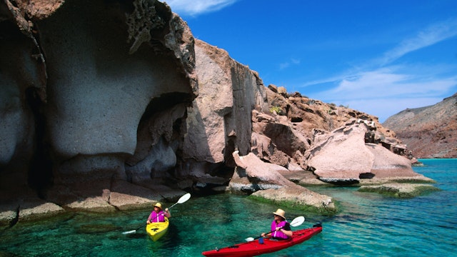 Kayaking on clear island waters.
