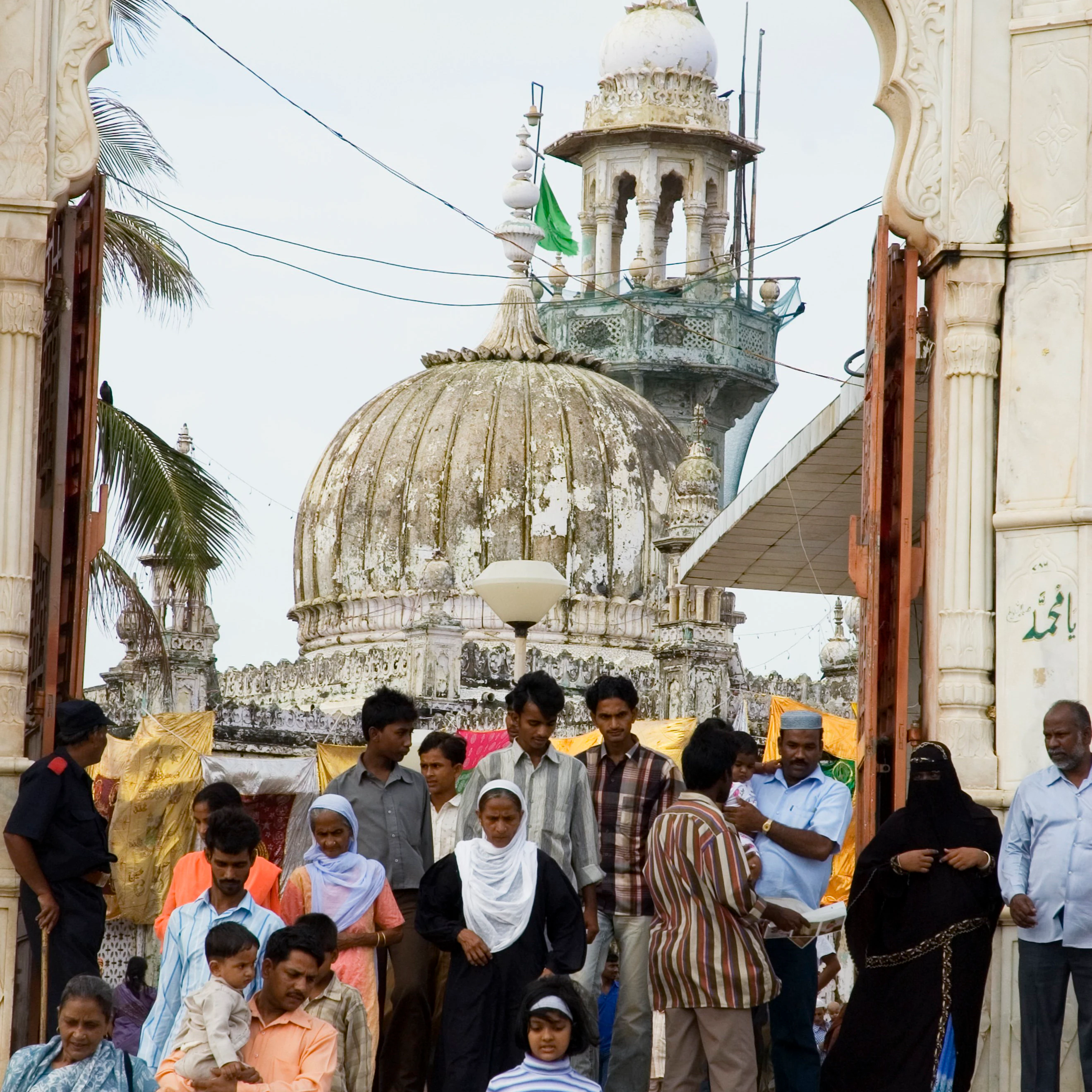 Pilgrims and mosque at Haji Ali.