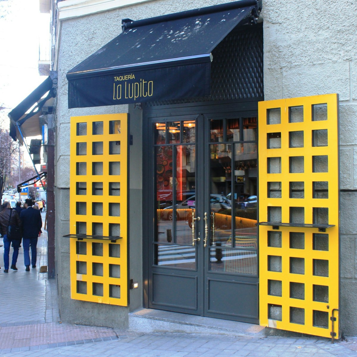 The yellow doors at Taquería La Lupita.