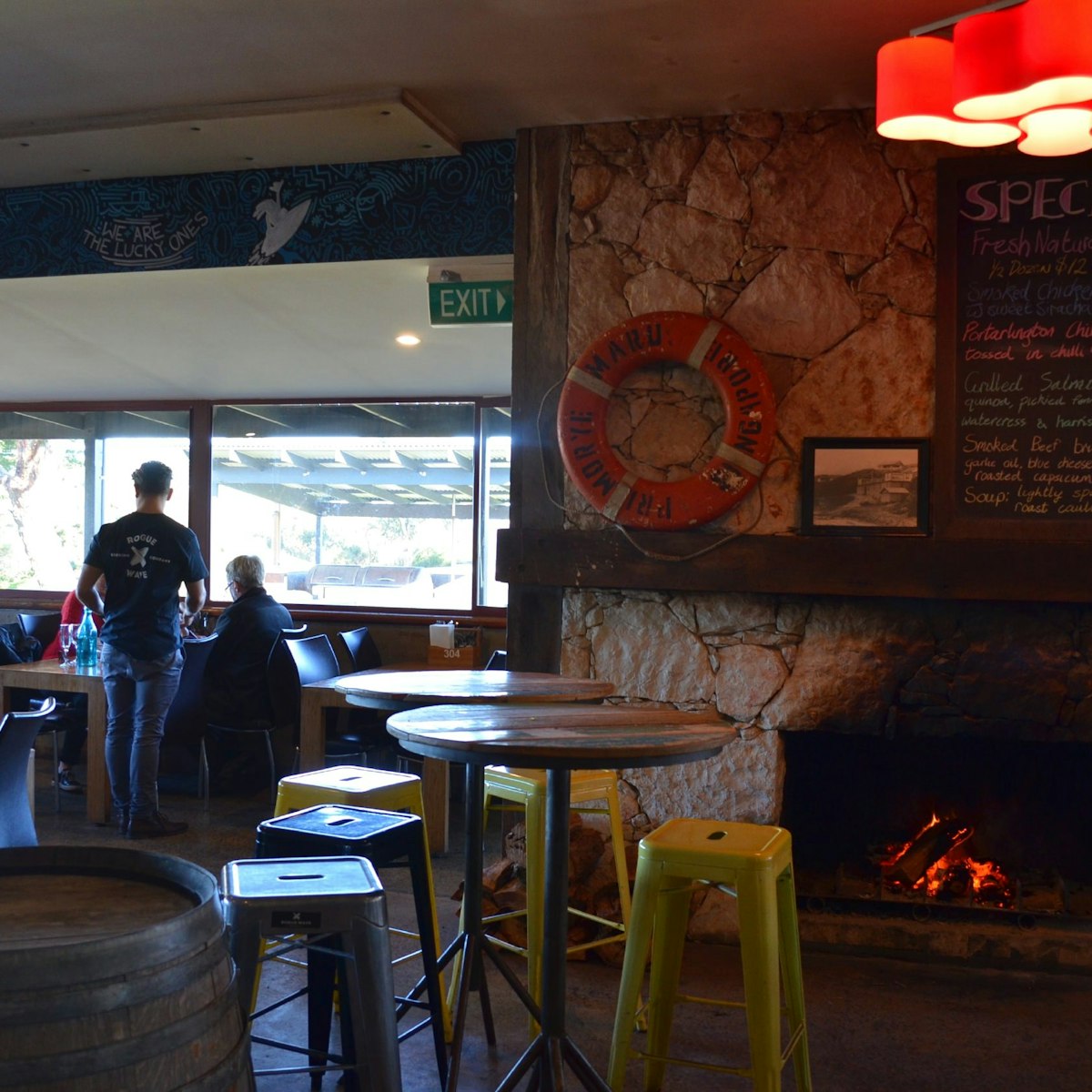 Inside the Aireys Pub with fireplace.