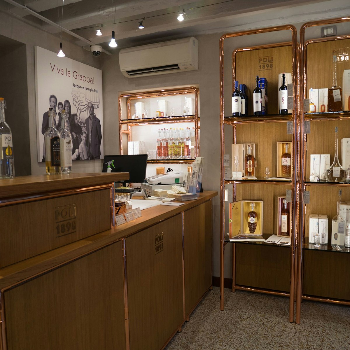 Poli Distillerie, bottles of grappa line the shelves of this charming shop