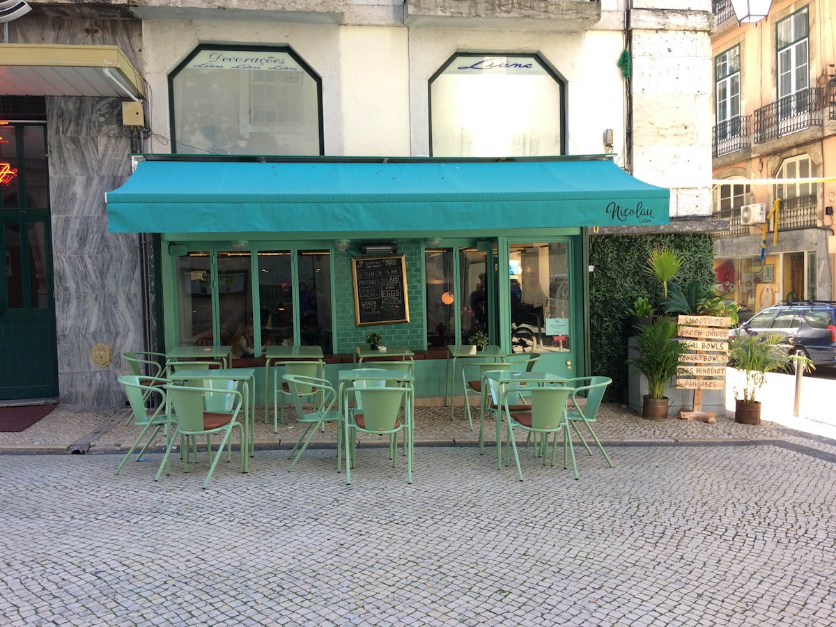 The teal cafe Nicolau Lisboa stands out at Baixa