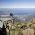 Australia, Tasmania, Hobart. Tourists take in the spectaular view of Hobart from the top of Mount Wellington at 1271m.