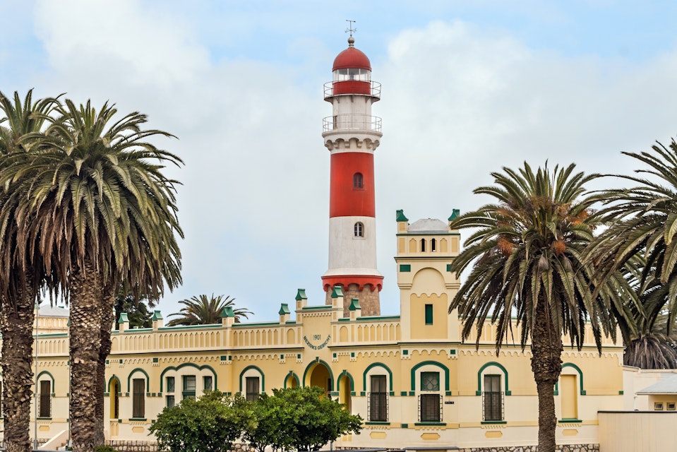 SWAKOPMUND, NAMIBIA - 2006/11/07: View at the Lighthouse and the colonial architecture courthouse of the Southwest African city. (Photo by Olaf Protze/LightRocket via Getty Images)