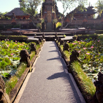 Ubud Water Palace (Pura Taman Saraswati) with lily pond in foreground.