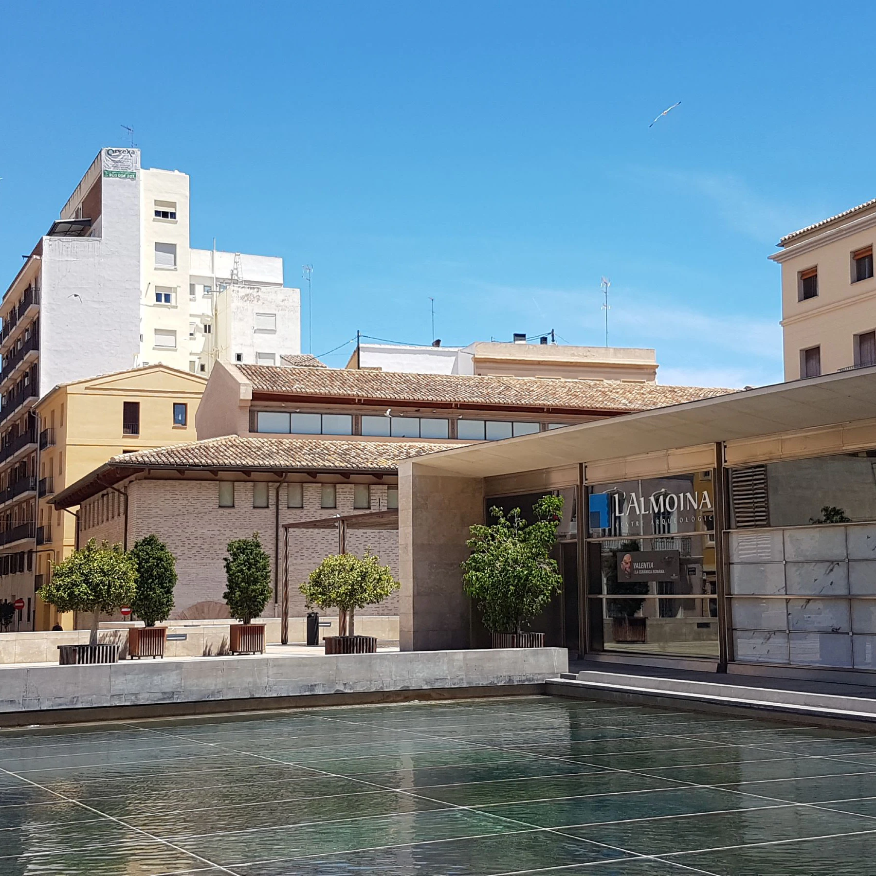 Outside entrance of L'Almoina including water feature.