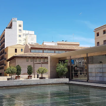 Outside entrance of L'Almoina including water feature.
