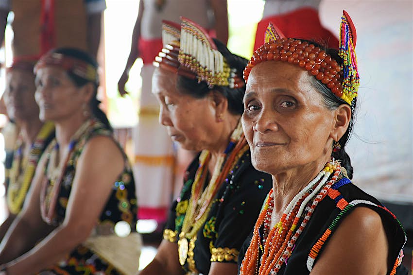Murut lady in traditional costume with colorful beads during folklore festival in Sipitang, Sabah