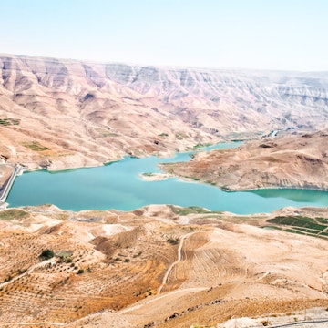 Wadi Al Mujib panoramic view on beautiful mountain and lake, Jordan; Shutterstock ID 79914043; Your name (First / Last): Lauren Keith; GL account no.: 65050; Netsuite department name: Online Editorial; Full Product or Project name including edition: Jordan Online Update