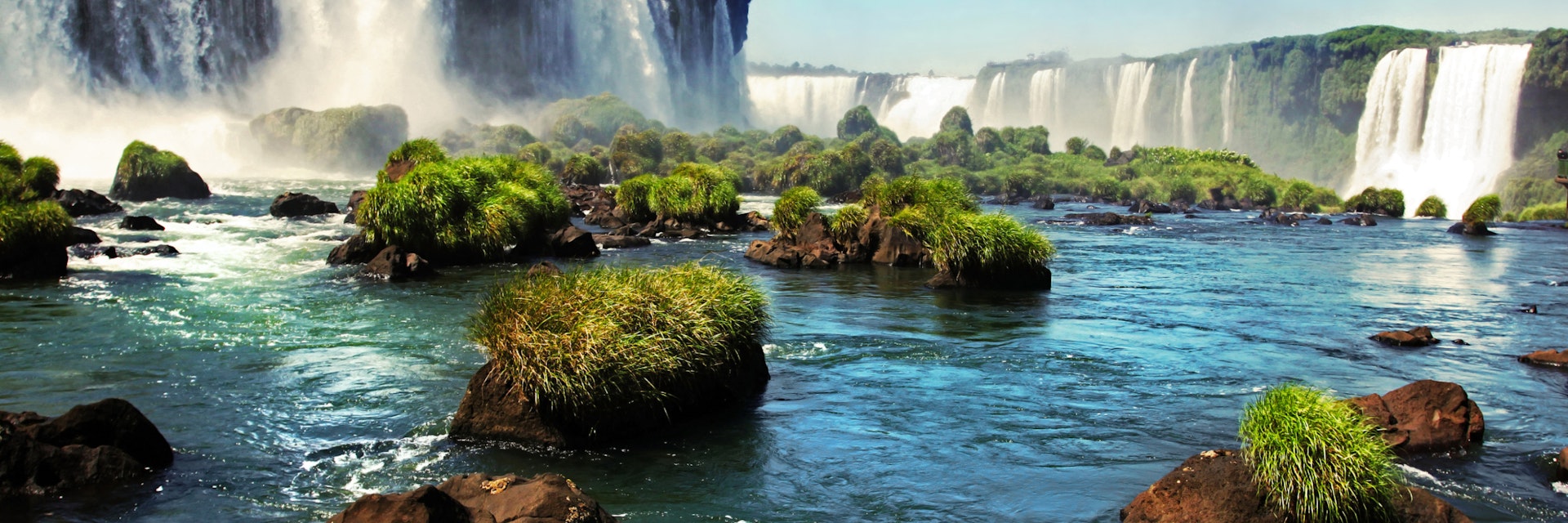 Iguazu falls are waterfalls of the Iguazu River on the border of the Argentina province of Misiones and the Brazilian state of Paraná. The falls divide the river into the upper and lower Iguazu. The Iguazu River rises near the city of Curitiba. The river flows through Brazil for most of its course, although most of the falls are on the Argentine side. Below its confluence with the San Antonio River, the Iguazu River forms the boundary between Argentina and Brazil.