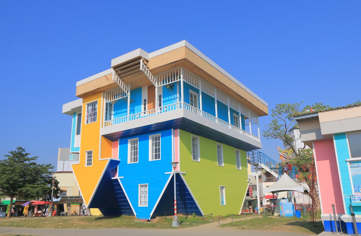 KAOHSIUNG TAIWAN - DECEMBER 13, 2016: Upside down house Pier 2 Art Center Pier 2 Art Center was originally an abandoned warehouse site converted to the art centre.; Shutterstock ID 590977709; Your name (First / Last): Megan Eaves; GL account no.: 65050; Netsuite department name: Online Editorial; Full Product or Project name including edition: Best in Travel - Kaohsiung destination page POI images