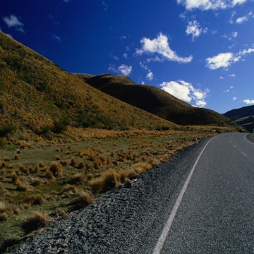 The barren landscape of Lindis Pass, the shortest route between Christchurch and Queenstown.