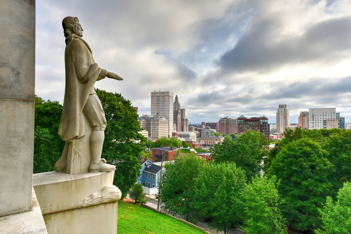 Prospect Terrace Park view of the Providence skyline and Roger Williams statue, Providence, Rhode Island, USA; Shutterstock ID 477150298; Your name (First / Last): Lauren Keith; GL account no.: 65050; Netsuite department name: Content Asset; Full Product or Project name including edition: Guides Project Eastern USA