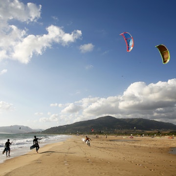 Kite surfers on Playa de los Lances beach, Tarifa, Andalucia, Spain.
