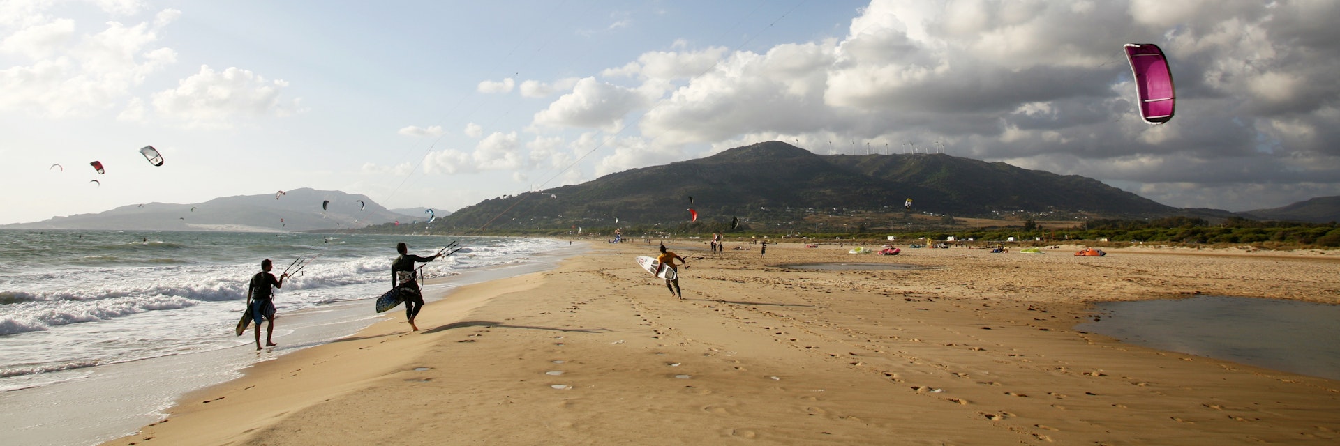 Kite surfers on Playa de los Lances beach, Tarifa, Andalucia, Spain.