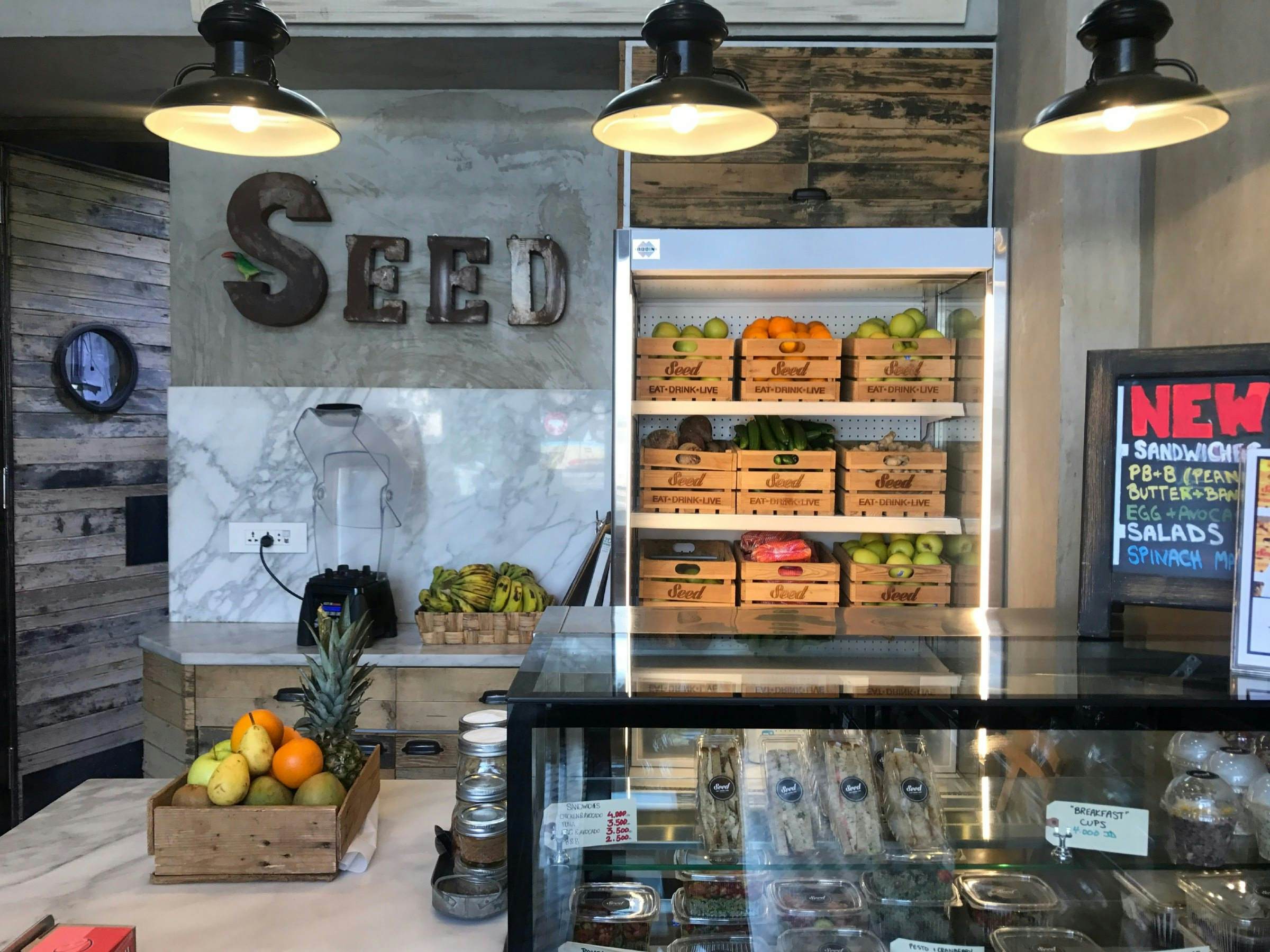 fresh fruits, veggies, and to-go foods on display at Seed