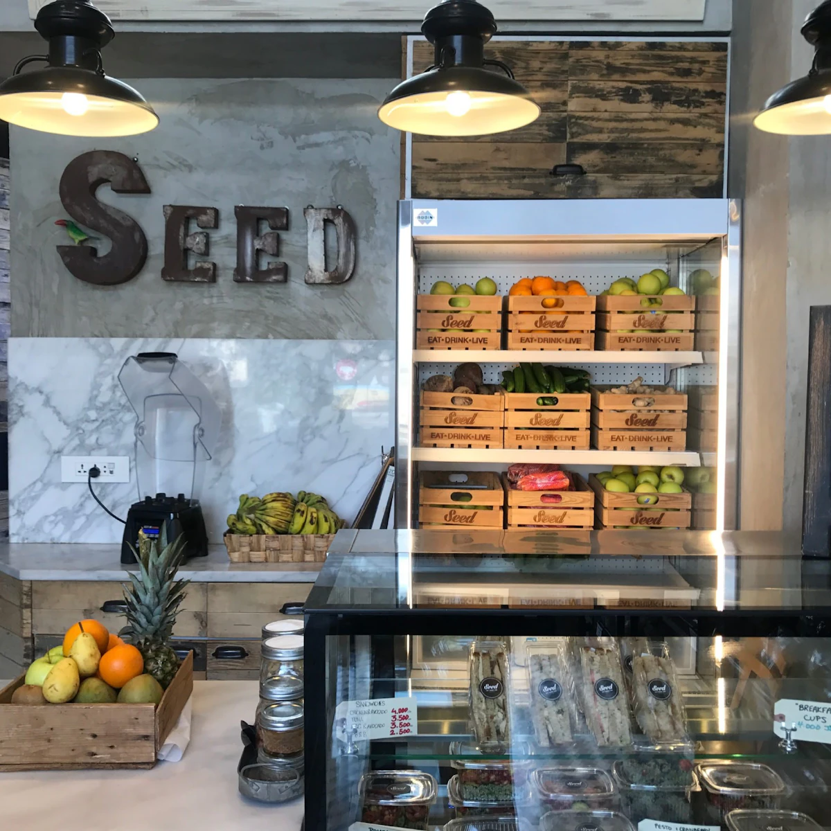 fresh fruits, veggies, and to-go foods on display at Seed