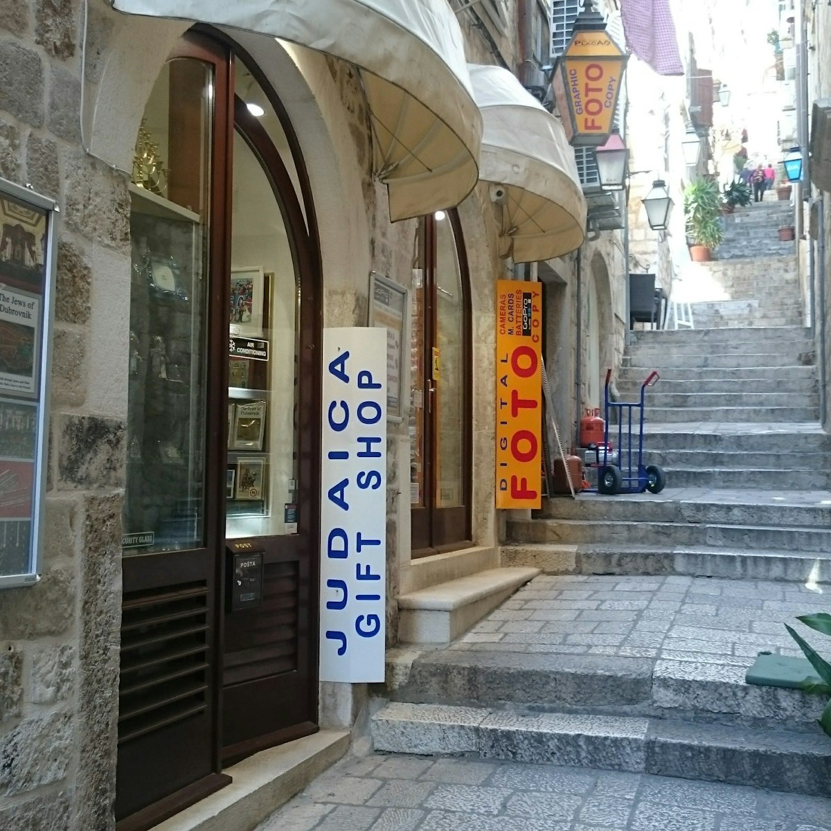 The view of Judaica shop and Photo studio Placa entrances
