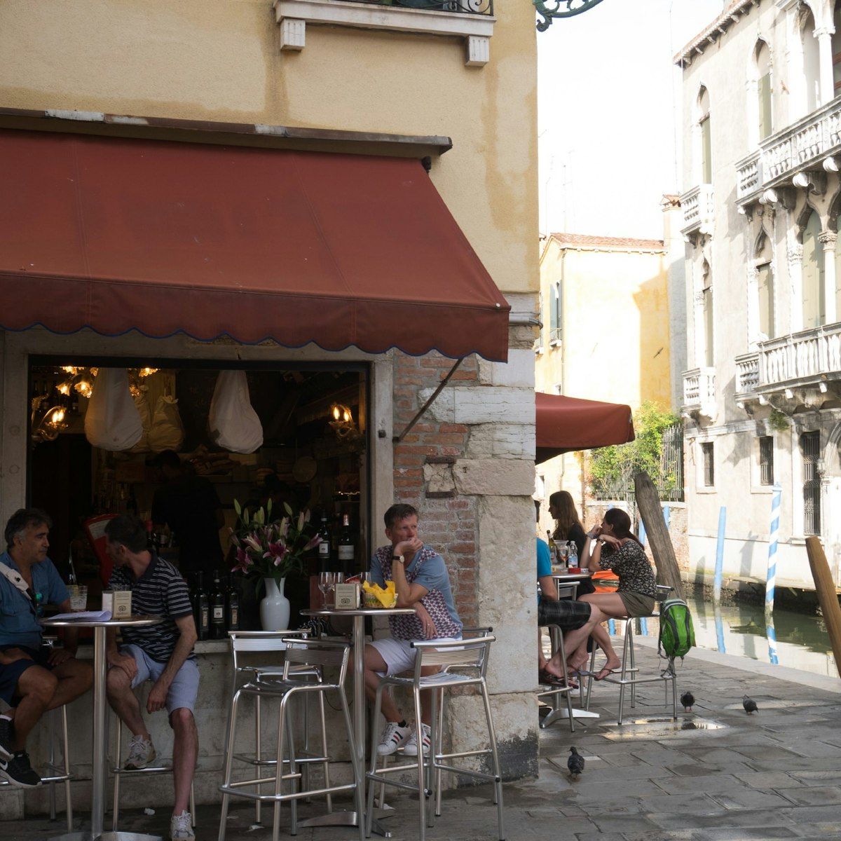 Guests enjoy a drink outside La Bottiglia