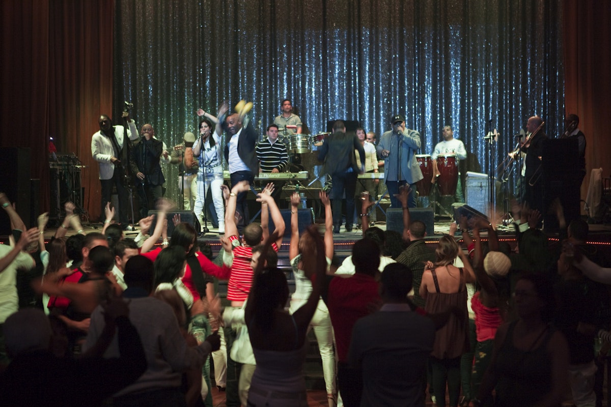 People dancing to live music at Casa de la Musica.
