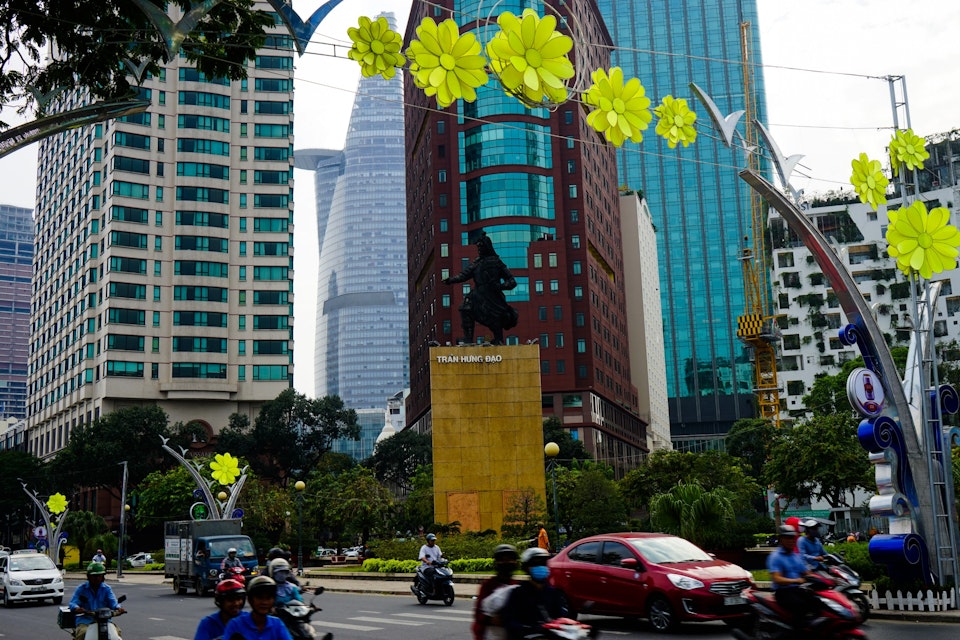 Statue of Tran Hung Dao at a busy roundabout