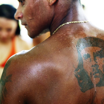 Man with Che tattoo at Maguana Beach near Baracoa.