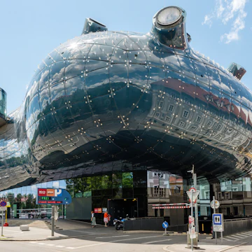 Graz, Austria - June 18, 2016: Kunsthaus Graz, an exhibition centre for contemporary art. The Kunsthaus with its futuristic design is also called the Friendly Alien by its architects Peter Cook and; Shutterstock ID 439401436; Your name (First / Last): Daniel Fahey; GL account no.: 65050; Netsuite department name: Online Editorial; Full Product or Project name including edition: Nice and Graz POIs