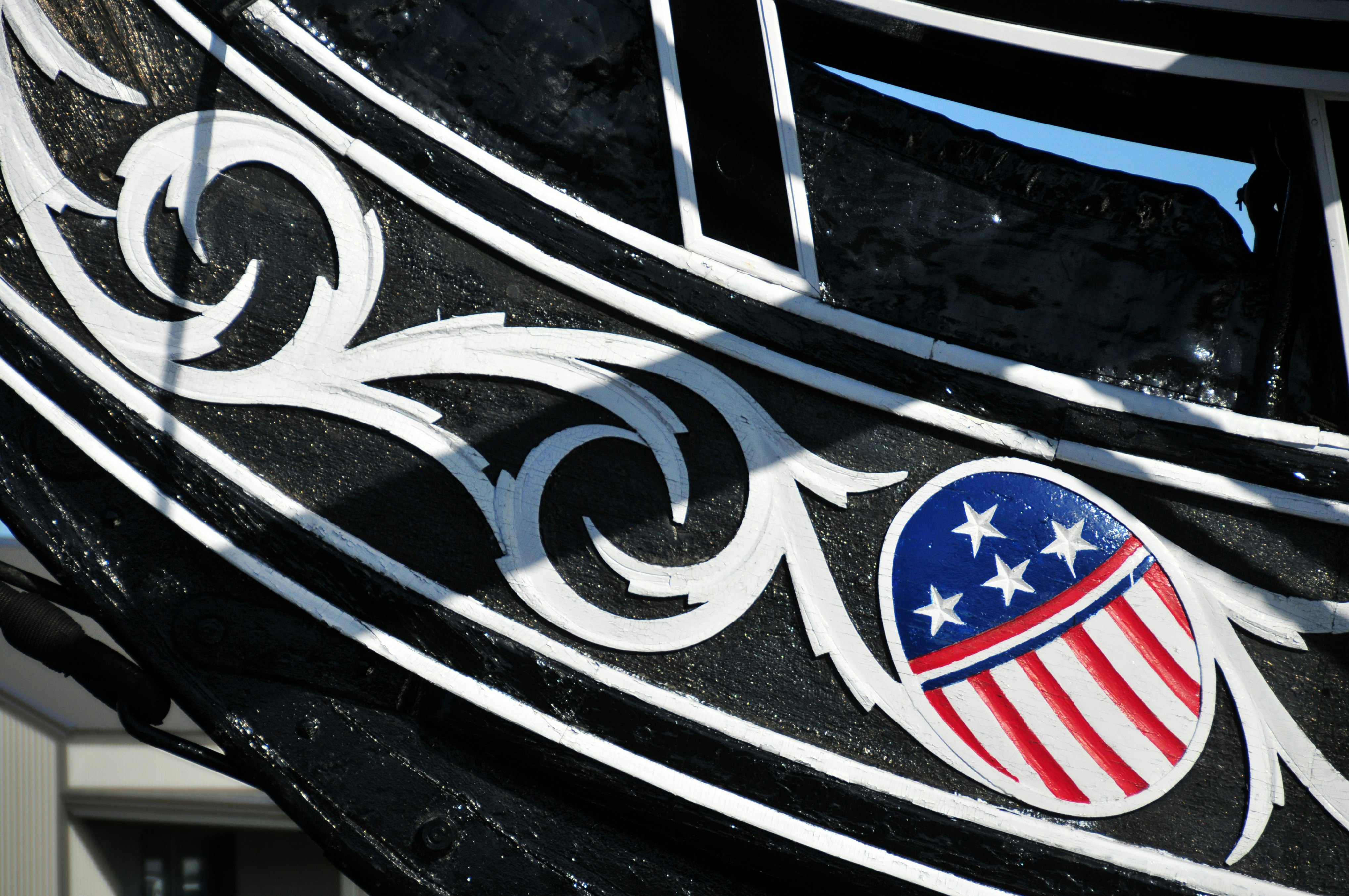 Boston, Massachusetts, USA: Charlestown Navy Yard - USS Constitution - prow decoration - stars and stripes - wooden-hulled, three-masted heavy frigate - Boston National Historical Park - photo by M.Torres