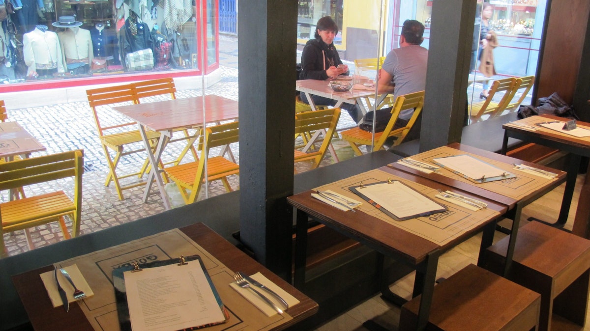 Tables and chairs inside, view to outside terrance, Sal Gorda restaurant.