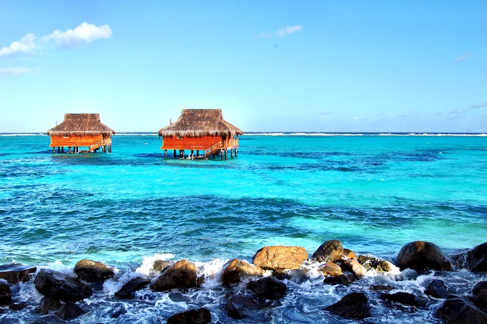 Two sea huts in the bay at Canouan in the Grenadines