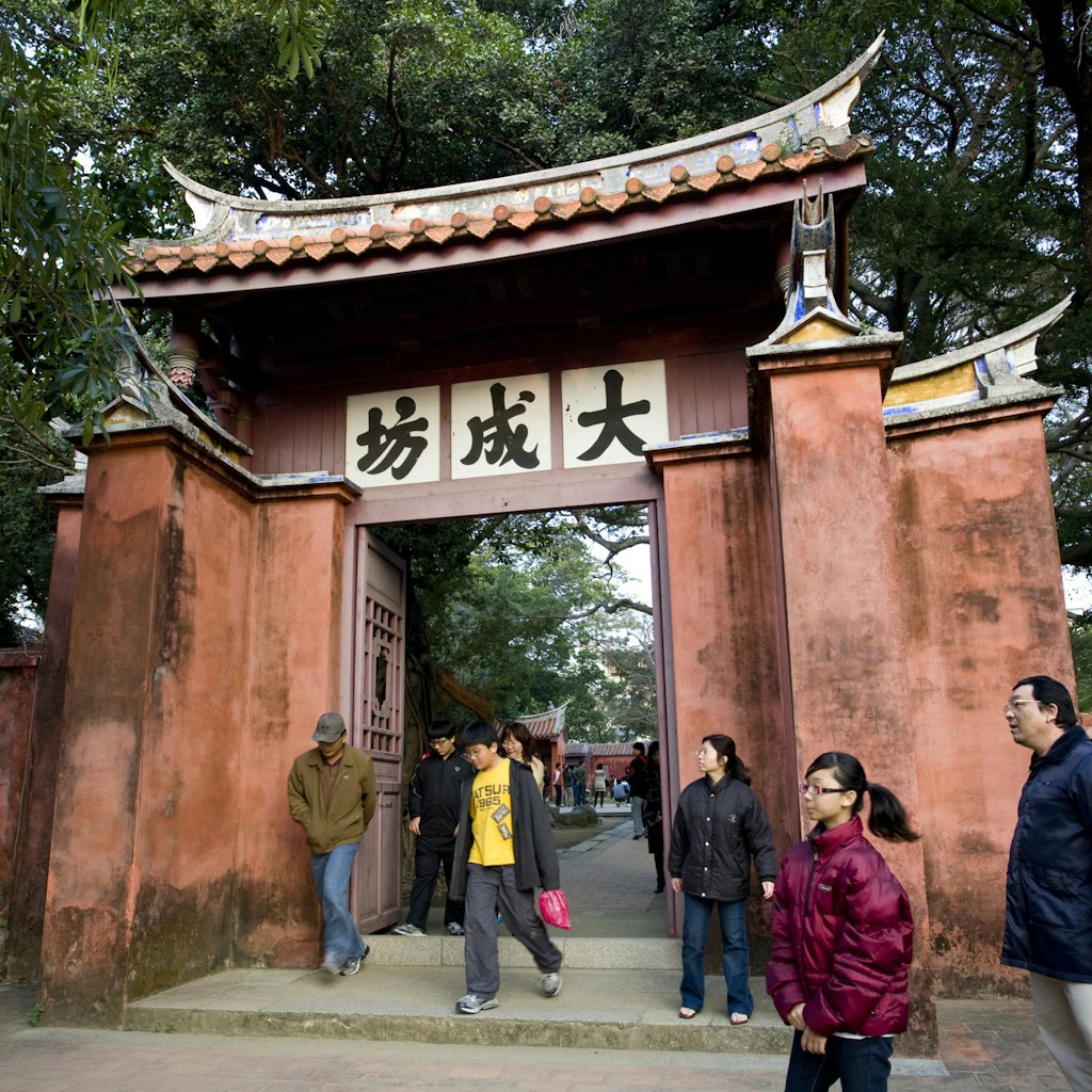 People in front of the gate of the Confucius Temple, Tainan, Republic of China, Taiwan, Asia