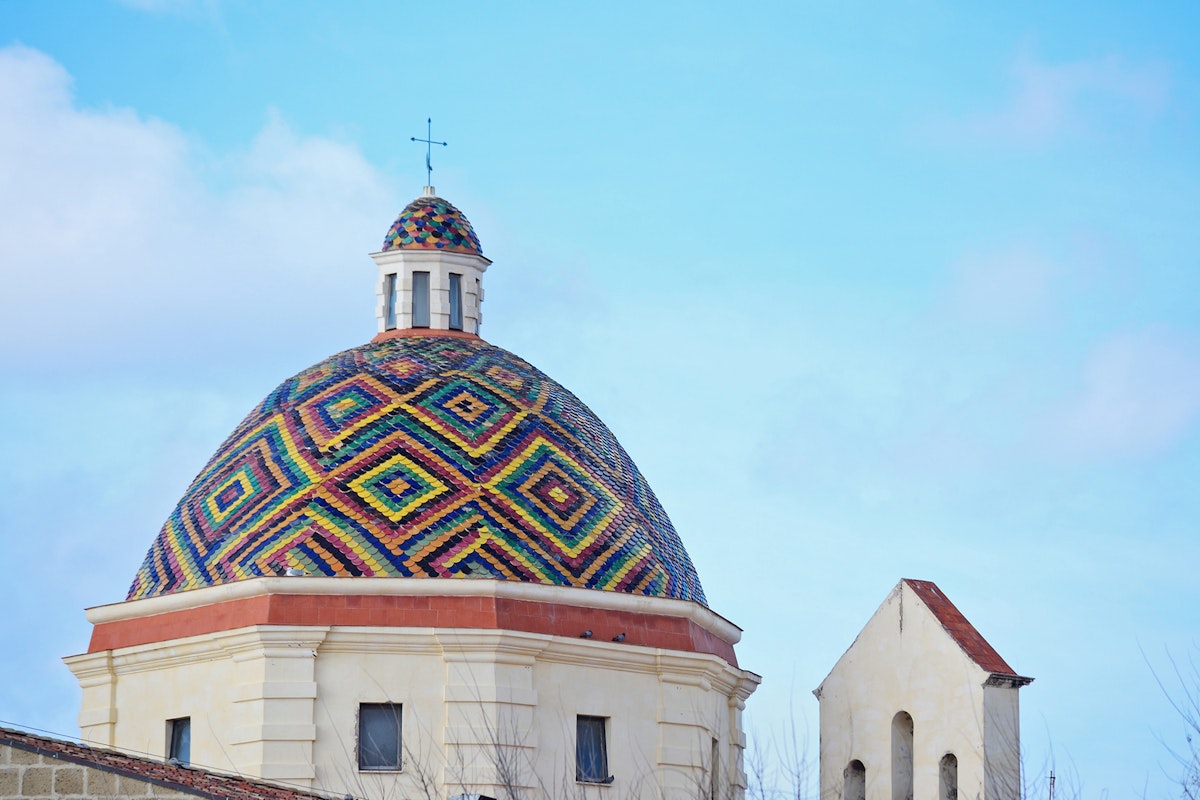 San Michele dome under a clear sky. Shot in Alghero, Italy; Shutterstock ID 231093382; Your name (First / Last): Anna Tyler; GL account no.: 65050; Netsuite department name: Online Editorial; Full Product or Project name including edition: destination-image-southern-europe