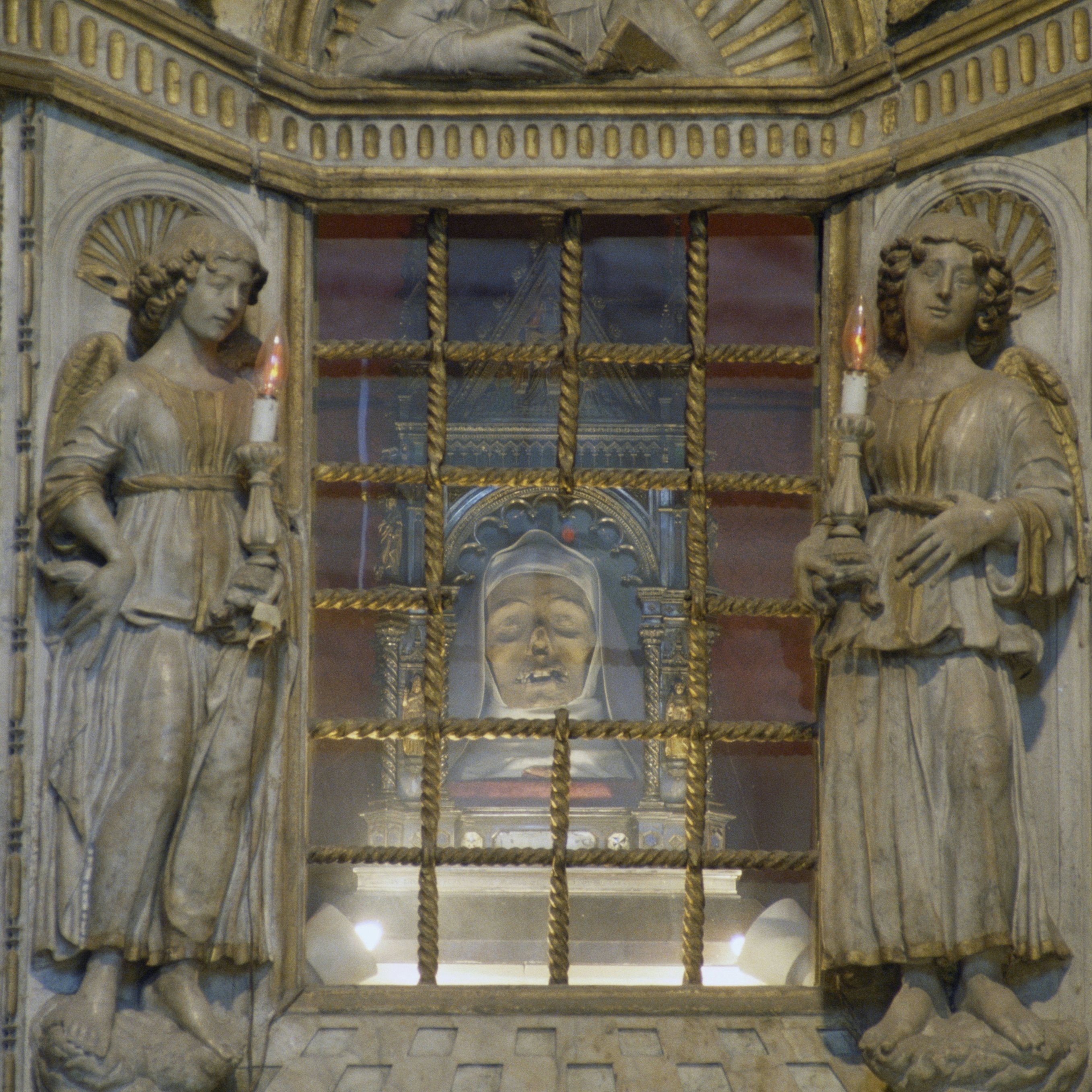 St Catherine of Siena's incorrupt head, marble altar by Giovanni di Stefano, 1469, interior of Basilica of San Domenico, historic centre of Siena (UNESCO World Heritage List, 1995), Tuscany, Italy