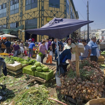 Vendors and buyers at Mercado Cardonal, ValparaIso, Chile