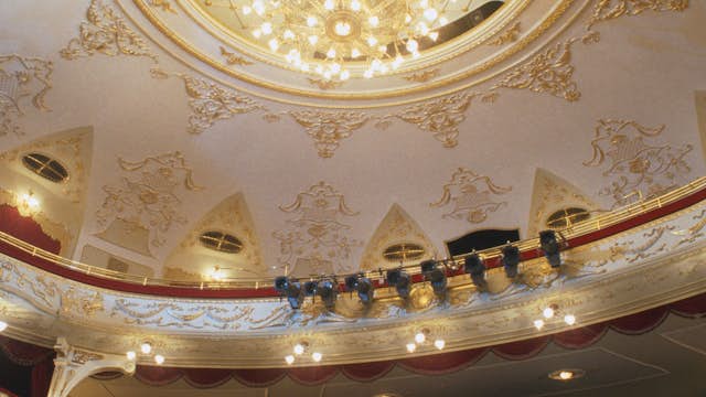 Decorated ceiling and galleries at neo-Classical Comedy Theatre.