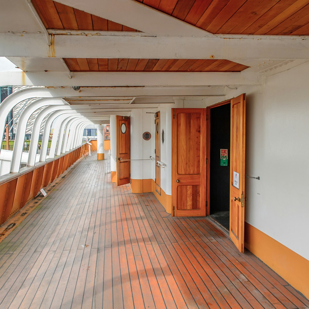 BELFAST, NI - JULY 16, 2016: Door at the SS Nomadic (1911), a steamship of the White Star Line. It was a tender to RMS Titanic on 10.04.1912; Shutterstock ID 452505922; Your name (First / Last): Lauren Gillmore; GL account no.: 56530; Netsuite department name: Online-Design; Full Product or Project name including edition: 65050/ Online Design /LaurenGillmore/POI