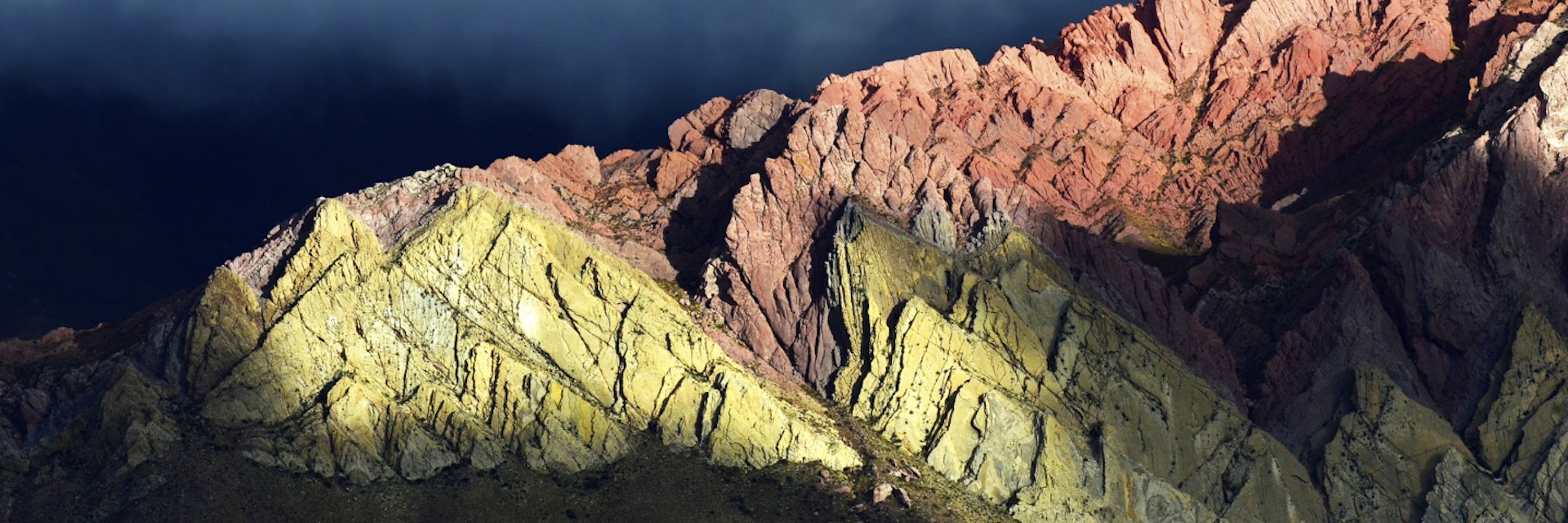 500px Photo ID: 101802245 - The Quebrada de Humahuaca rises far above the small town of Jujuy, Argentina....Jujuy is pronounced "Who-Who-E". It is such a magnificent mountain range that words are difficult to describe it. The colors and shapes are truly like nothing else I have personally seen and photographed in my journeys around the world. .I took this photograph while standing at 4300 meters in Argentina. Having spent a few months at sea level my head felt like it would split in two or maybe two hundred pieces. This mountain range is magical and I had to wait to see what light I would get on my subject. I have never felt the effects of altitude before but I feel the wait and the pain were worth my time. Argentina and all of South America holds some incredible sights and I hope you enjoy this one...Cheers Bob