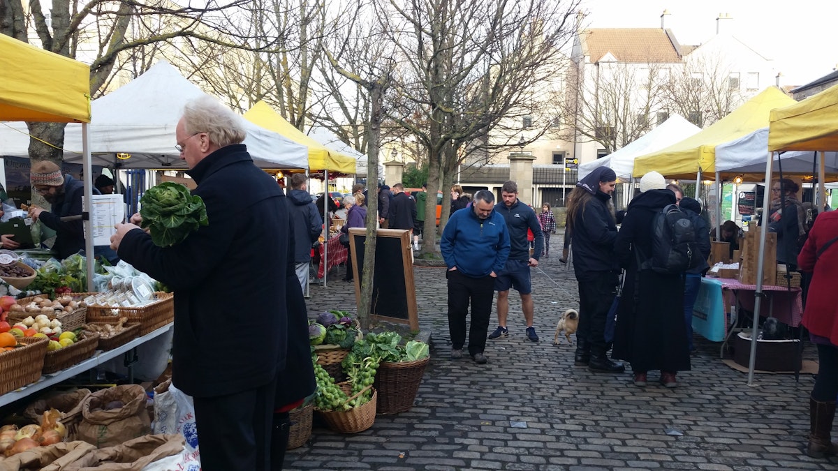 Locals shopping at Leith Farmers Market on Dock Place