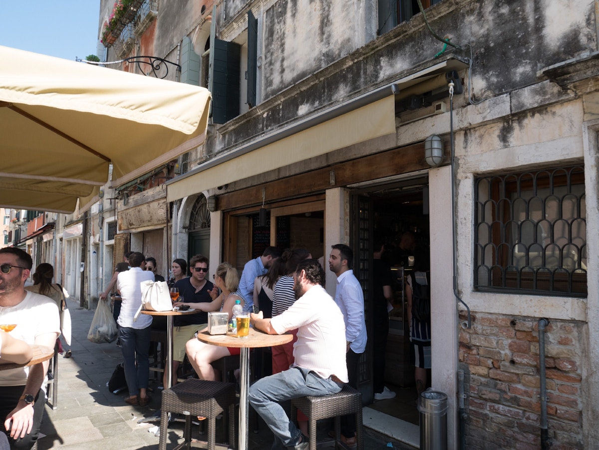 Grab a table outside to enjoy the bustle of Via Garibaldi